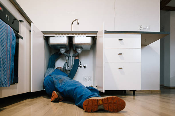 Professional Drain Cleaning technician working in Waukesha, WI